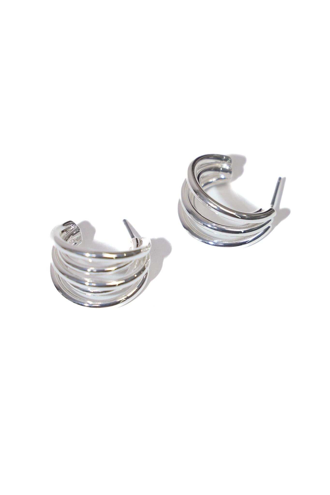 CUT OUT CURVES HOOPS - SILVER